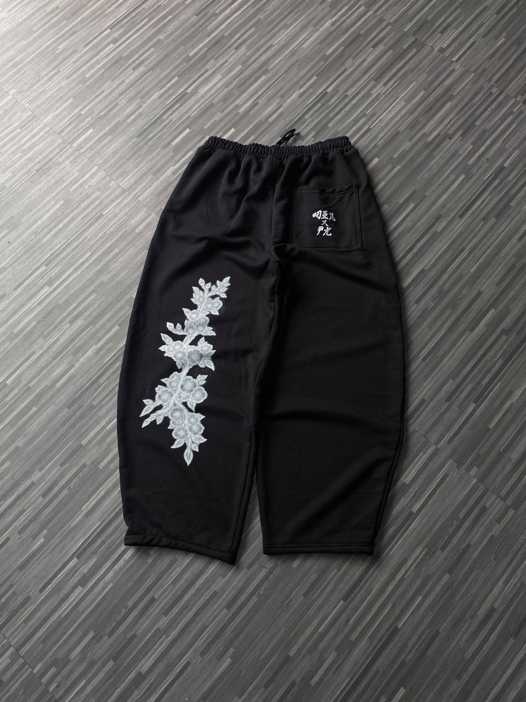 CALÇA BARREL FLORES