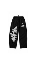 CALÇA BARREL FLORES